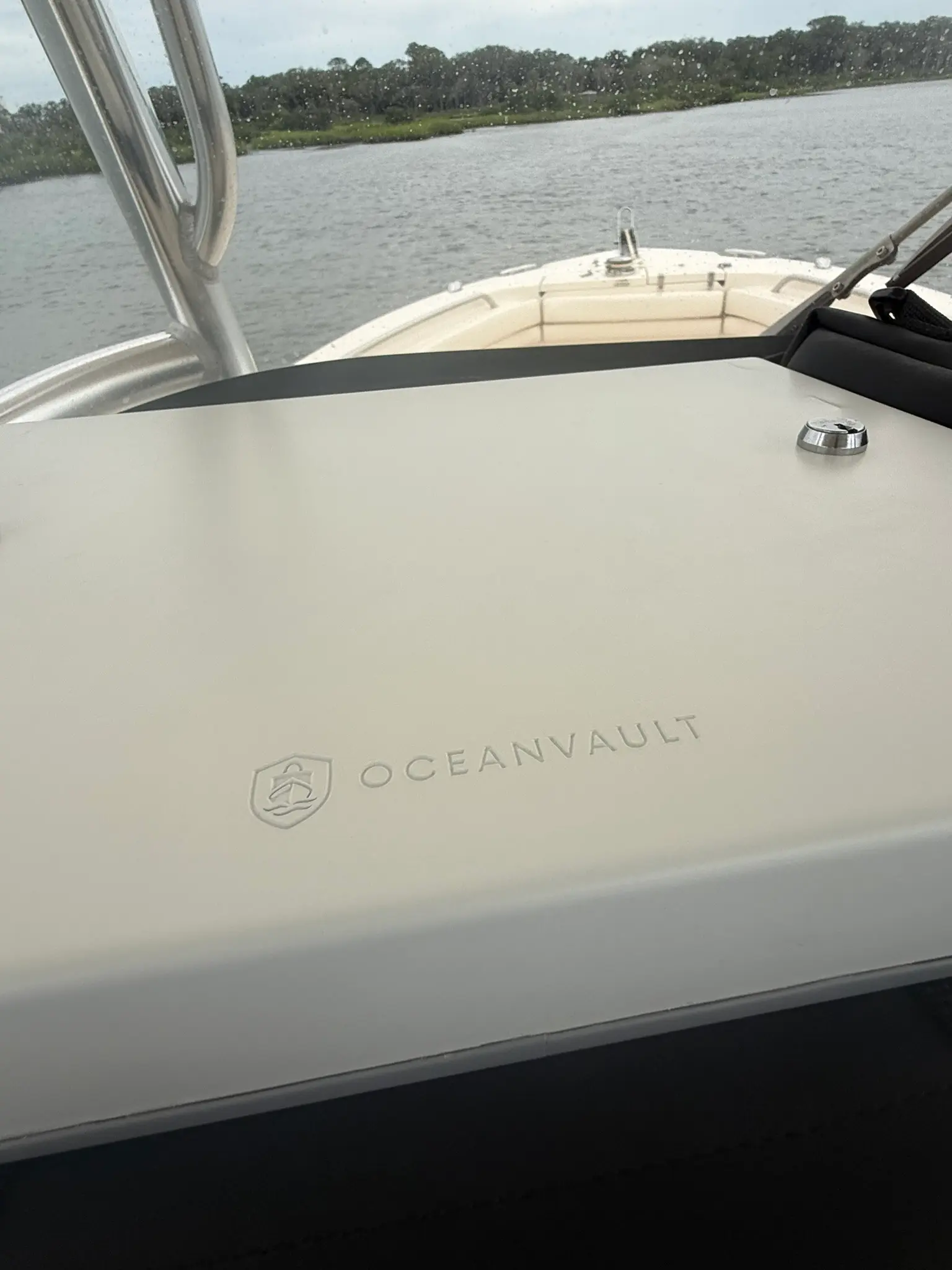Close-up of the Ocean Vault logo and a cover lock